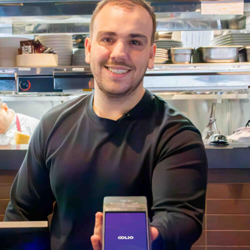 Anthony from Meat Flour Wine with Oolio payments terminal